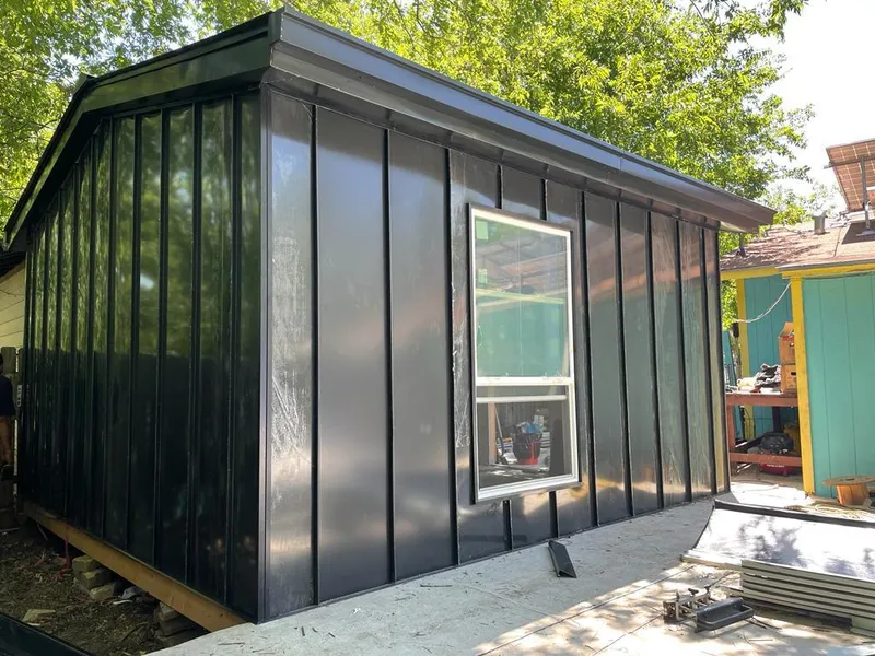 Black standing seam metal wall panels for Roof Inspection in Eau Claire